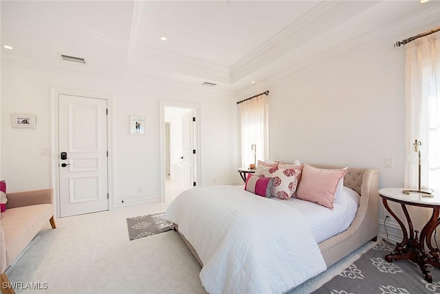 bedroom with light carpet, visible vents, multiple windows, and ornamental molding