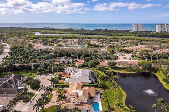 drone / aerial view with a water view
