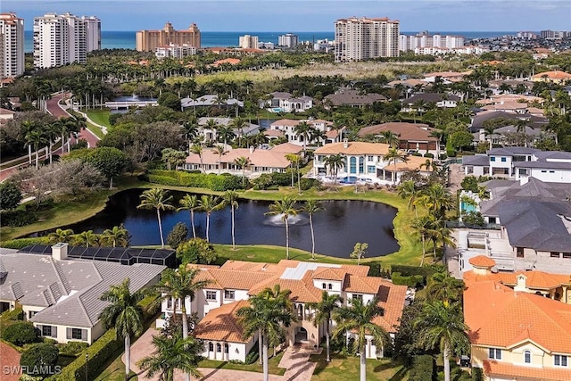 aerial view featuring a residential view and a water view