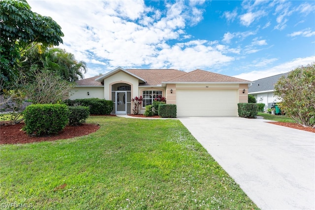 ranch-style home with a front yard and a garage