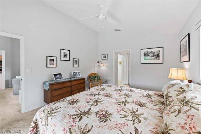 bedroom with light carpet, high vaulted ceiling, and ceiling fan