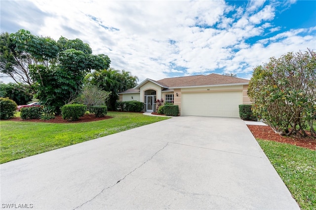 ranch-style home with a front lawn and a garage