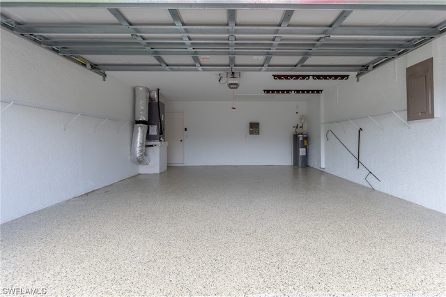 garage featuring a garage door opener and water heater