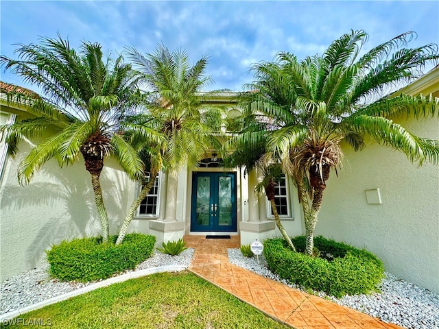 doorway to property featuring french doors