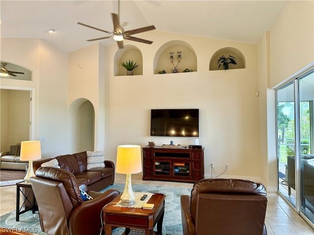 living room featuring high vaulted ceiling, ceiling fan, and light tile flooring