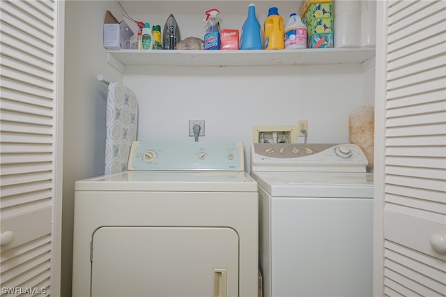 laundry area with hookup for an electric dryer, washing machine and clothes dryer, and hookup for a washing machine