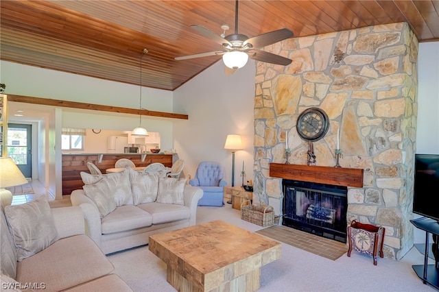 living room with a fireplace, ceiling fan, wooden ceiling, and light colored carpet