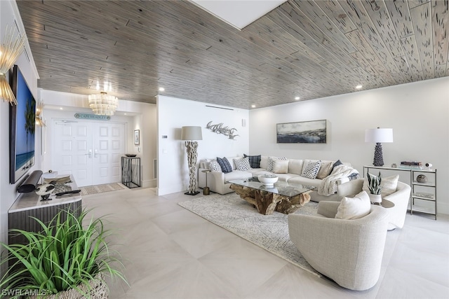 living room featuring light tile floors and a notable chandelier