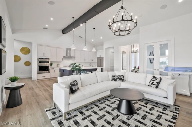 42231 Lake Timber Dr, Punta Gorda, FL 33982 - living room featuring a chandelier, beamed ceiling, light wood-type flooring, high vaulted ceiling, and recessed lighting