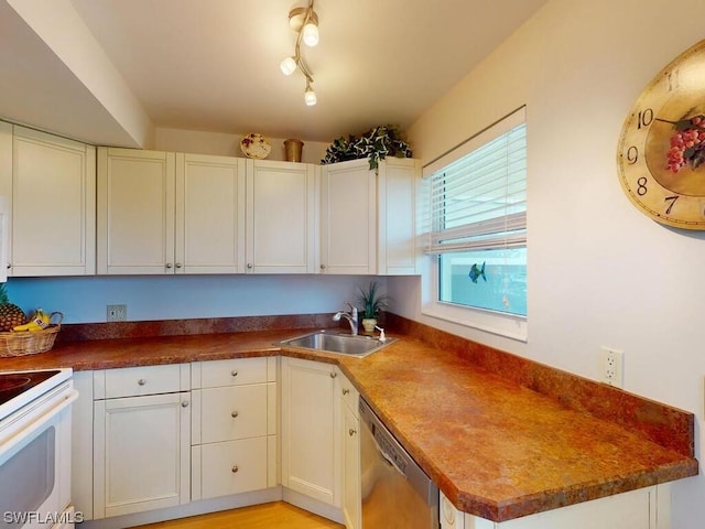 kitchen with white cabinetry, white electric stove, track lighting, dishwasher, and sink