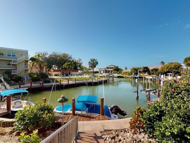 dock area featuring a water view