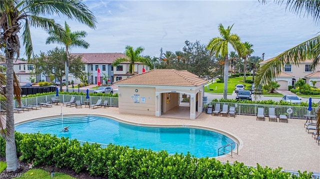 view of swimming pool featuring a patio