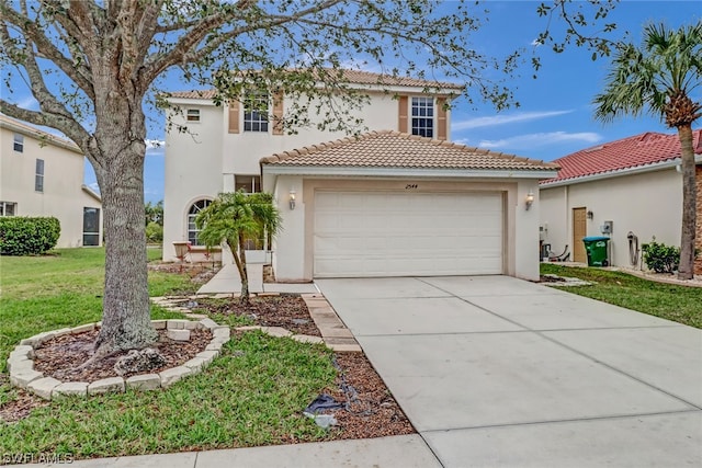 mediterranean / spanish house with a front lawn