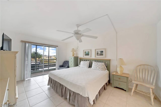 bedroom featuring access to outside, ceiling fan, and light tile flooring