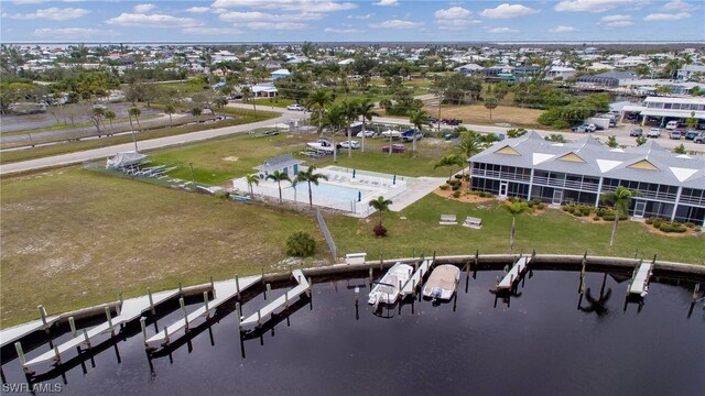 bird's eye view with a water view