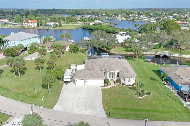 drone / aerial view with a water view