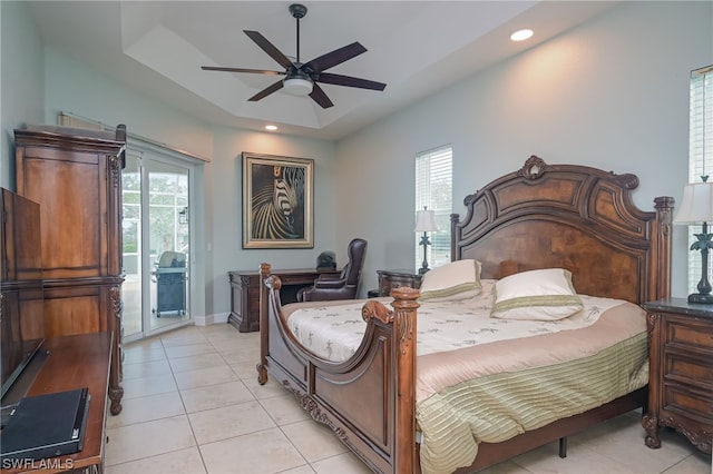 bedroom with ceiling fan, access to exterior, light tile patterned floors, and multiple windows