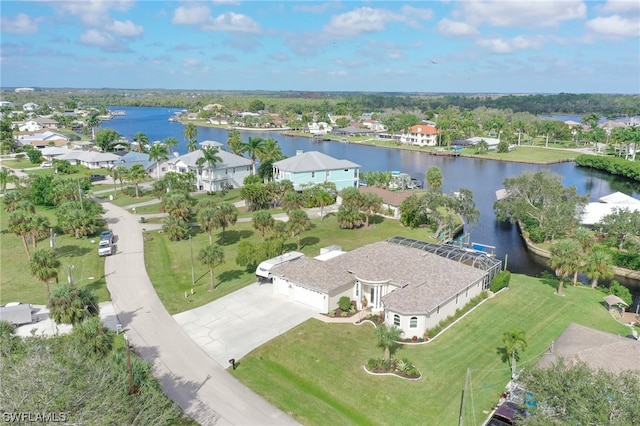 bird's eye view with a water view