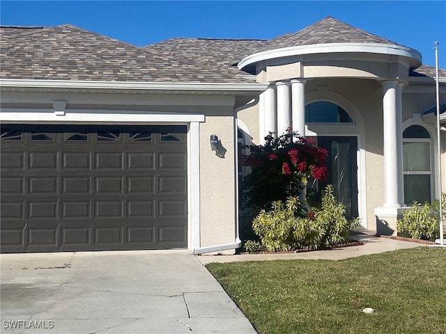 entrance to property featuring a garage