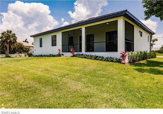 view of front of house featuring a front lawn