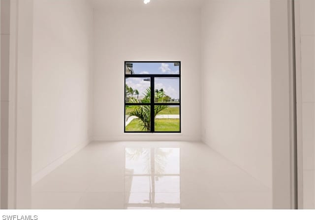 empty room with light tile flooring