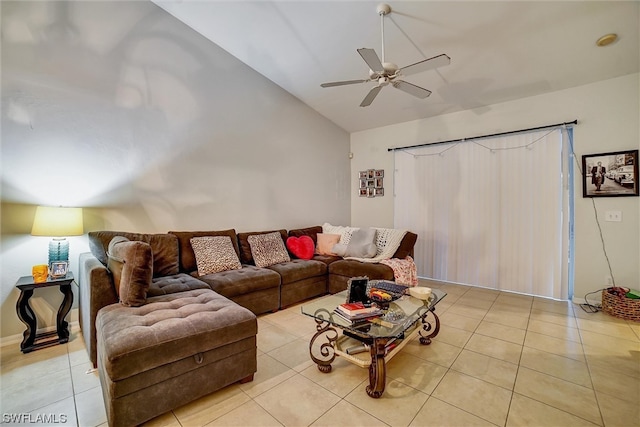 tiled living room featuring vaulted ceiling and ceiling fan