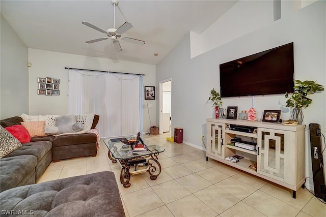 living room featuring vaulted ceiling, light tile flooring, and ceiling fan