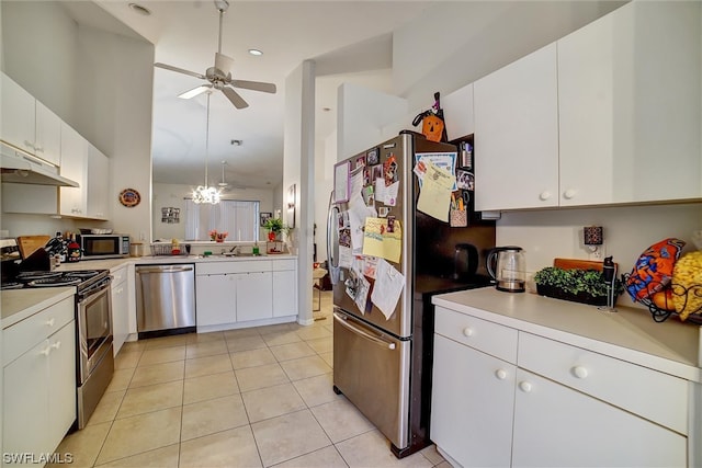 kitchen featuring white cabinetry, ceiling fan, appliances with stainless steel finishes, and light tile floors