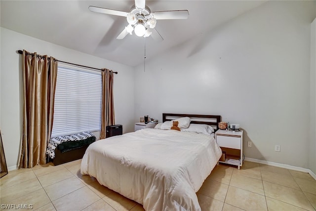 tiled bedroom with ceiling fan