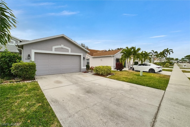 ranch-style house with a front lawn and a garage