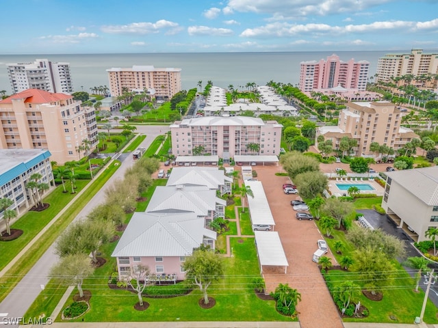 bird's eye view with a water view