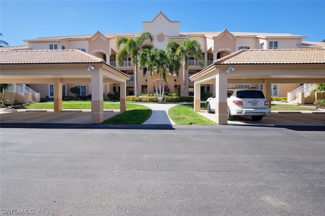 exterior space with a carport