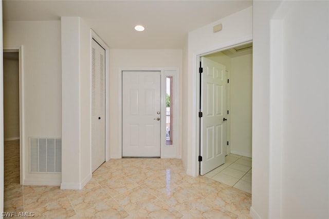 view of tiled foyer entrance