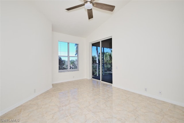 tiled empty room featuring lofted ceiling and ceiling fan