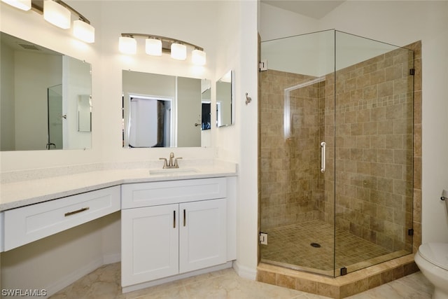 bathroom with toilet, tile flooring, an enclosed shower, and vanity