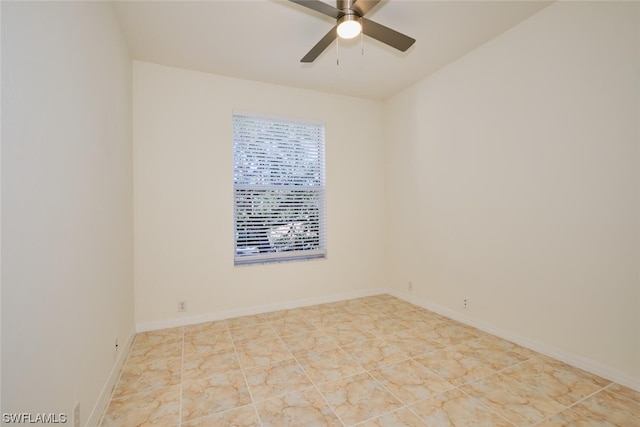 tiled empty room with ceiling fan