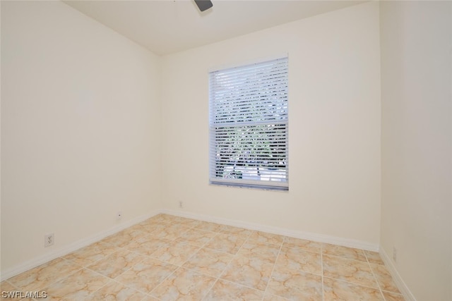 view of tiled spare room