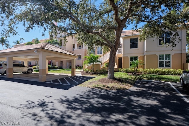 exterior space featuring a carport