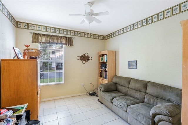 living room with ceiling fan and light tile patterned floors