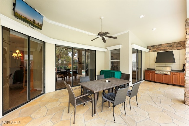 dining room with ceiling fan with notable chandelier and ornamental molding