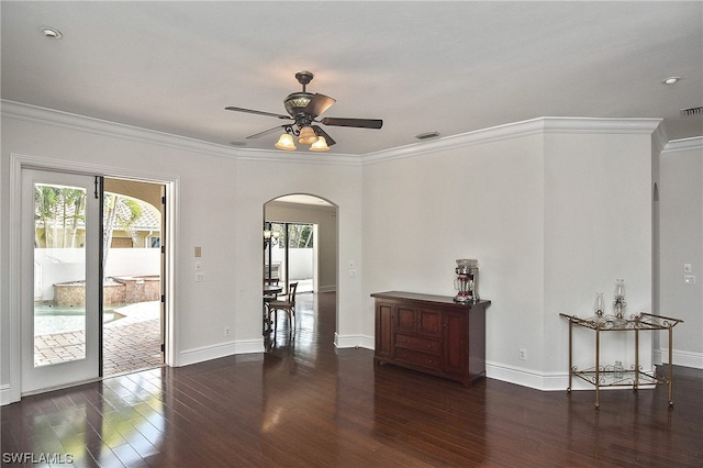 unfurnished room featuring ceiling fan, a healthy amount of sunlight, and ornamental molding