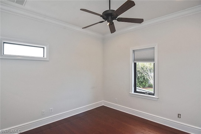 empty room with dark hardwood / wood-style floors, ceiling fan, and ornamental molding