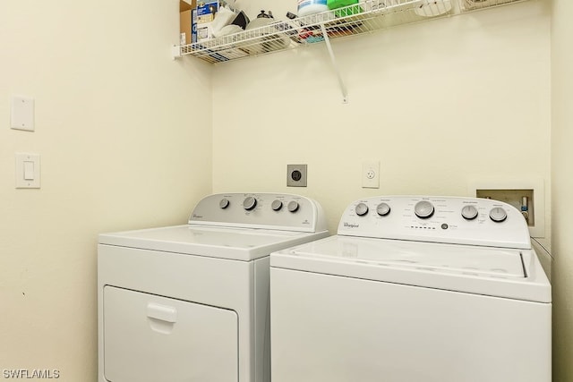 laundry area featuring separate washer and dryer