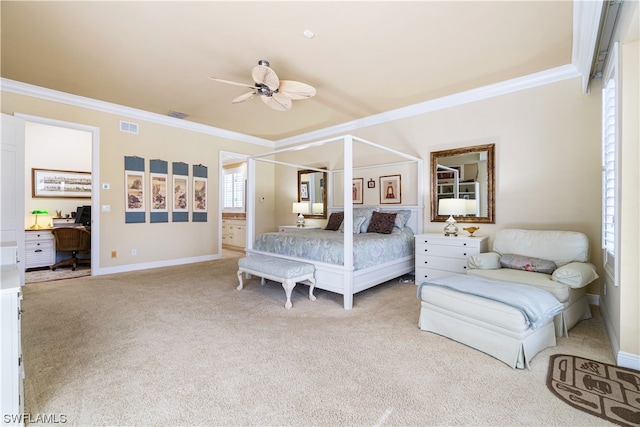 carpeted bedroom featuring ceiling fan and crown molding