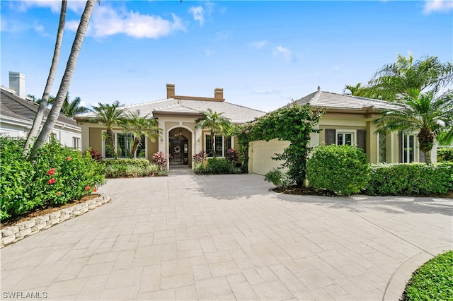 view of front of property with a garage