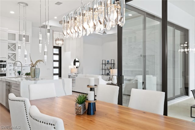 tiled dining room with sink