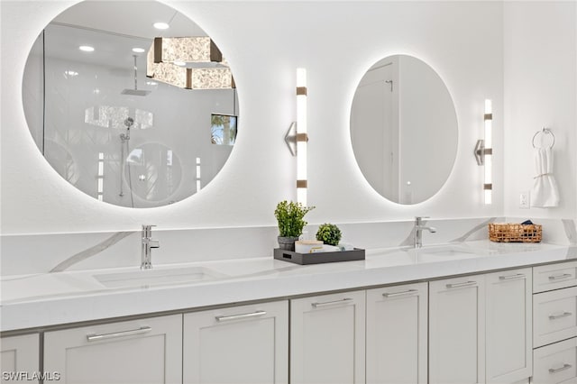 bathroom featuring dual bowl vanity