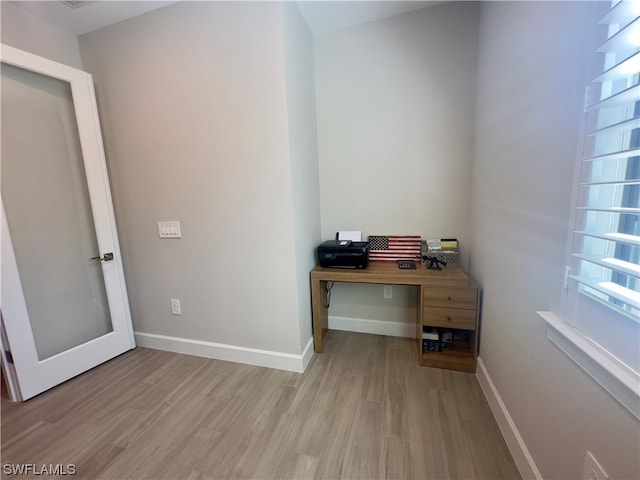 office area featuring light hardwood / wood-style floors