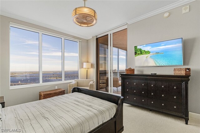 carpeted bedroom featuring crown molding