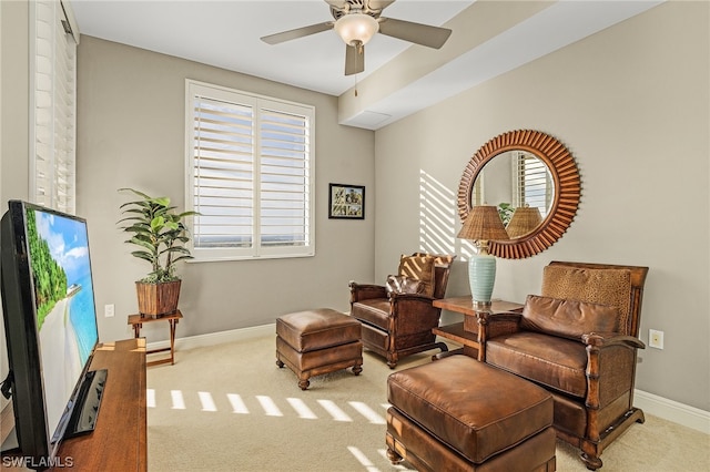 sitting room with light carpet and ceiling fan